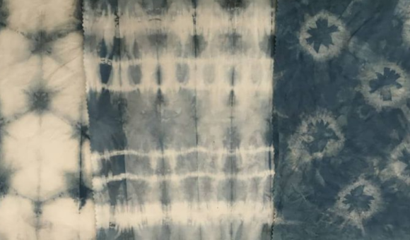 Tie-dye patterns with indigo dyes, result of Nyananyana workshop.