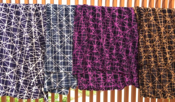 An array of Silang, batikTEKTURA's architecture-inspired batik, in different colours.